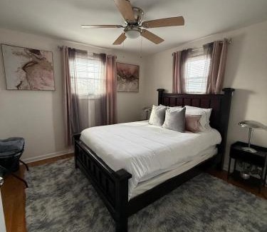 Atlantic City House | Stylish Cozy Quiet Family Retreat and Romantic getaway Sleeps up to 7 with Fast Wifi, Free Parking, Work station, Alexa enabled, Fenced in Backyard for Pets Grill Party Patio, Porch, Beach, Canal, stadium,Boardwalk Restaurants, and much more!