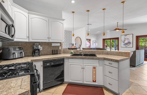 Racquet Club West House | Stylish, dog-friendly home with private pool, pool spa, enclosed yard & grill