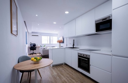 Castillejos Apartment | Stylish High-Floor Retreat with Sunny Terrace