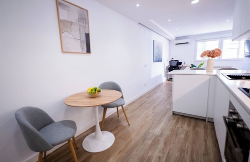 Castillejos Apartment | Stylish High-Floor Retreat with Sunny Terrace