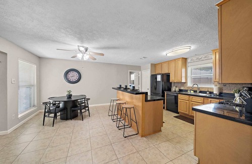 La Porte Apartment | Stylish Home Minutes from the Beach with Backyard Bliss