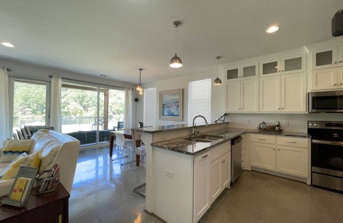 Mid America House | Stylish Lakefront Home - Serene Summer Views and Private Waterfront Access