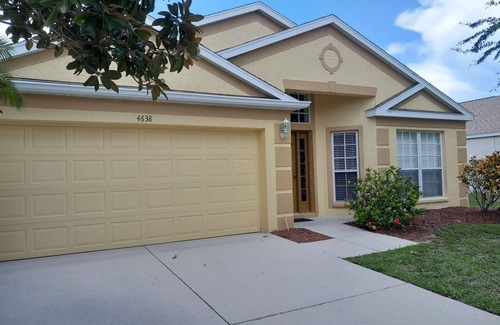Sabal Harbour Villa | Stylish Lakefront Villa with South Facing Pool. A short drive to fine beaches.