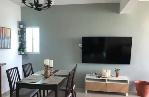Licey al Medio Condo | Stylish Penthouse Suite with pool and views