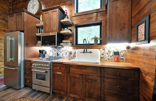 Hayward Cabin | Stylish Signature Lodge, nestled in the Forest, with Teal Lake views