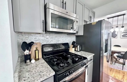 Clinton Township House | Stylish, Spacious, 4 TV's, Game Room w/Bar and Lounge Area