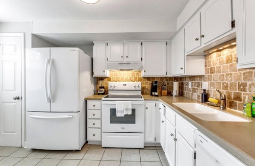 Greensboro Apartment | Stylish, spacious Uptown Condo! Perfect for large families and groups! Private patio! Minutes from downtown and airport!