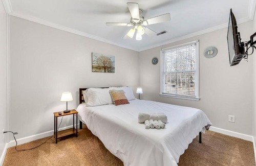 Greensboro Apartment | Stylish, spacious Uptown Condo! Perfect for large families and groups! Private patio! Minutes from downtown and airport!