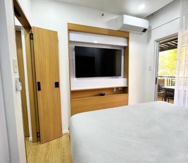 Taguig Apartment | Stylish Staycation near BGC w/Home Cinema