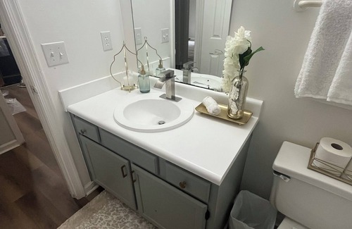Greensboro House | Stylish Townhome Guest Room with Guest Bath
