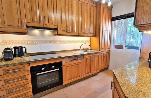 Bahia de Casares House | Stylish townhouse, seaviews, air-con and garden, 10 mins walk to the beach and large communal pool