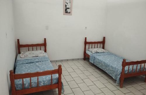 Penha Apartment | Suìte Madagascar