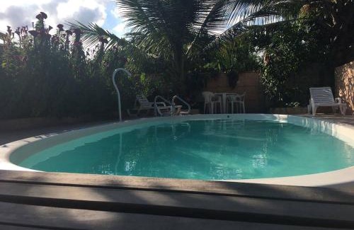 Bairro da Enseada House | Suíte 1 com piscina e wi-fi em Caraguatatuba