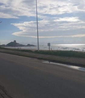 Praia Grande Apartment | Suíte beira-mar