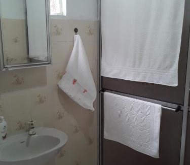 Fracalanza House | Suíte bem localizada.