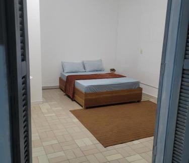 Centro House | Suíte Grão de Areia - de frente para o mar