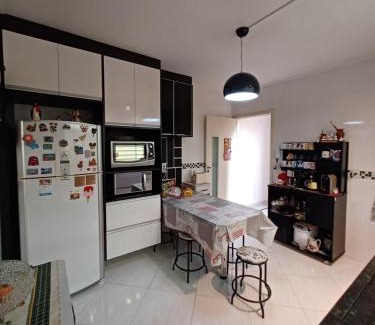 Tucuruvi House | Suíte privativa em casa de família