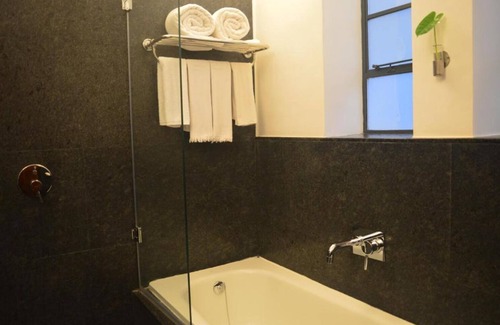 Fort Kochi Apartment | Suite 1 King bedroom at Malabar House