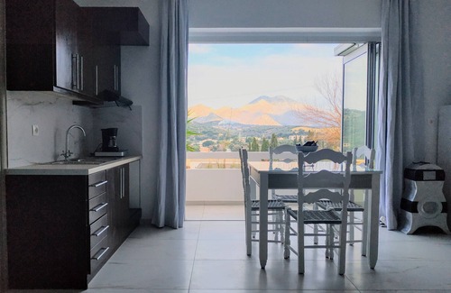 Geropotamos Apartment | Suite of light rooms with panoramic mountain view