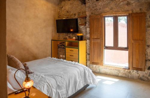 Santeagueda Apartment | Suite Raffaello: Diseño y Comodidad en Val'Quirico