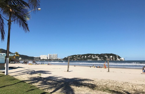 Enseada Apartment | Suites Seasonal Rental Guarujá comfortable suites located on the best beach!
