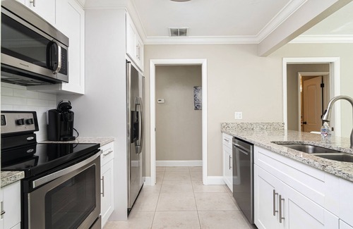 Naples Park House | SUMMER PROMOTION! Cute Designer Home, Heated Pool Oasis, Near Beach, FREE Bikes
