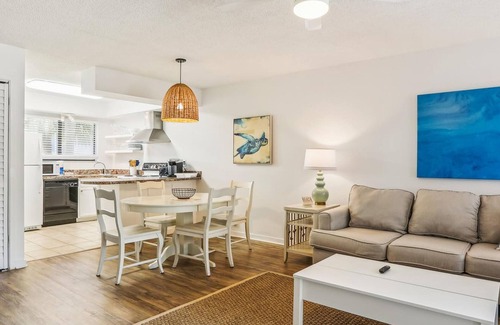 Butler Beach Apartment | Sun-kissed Paradise With Pool View Free Tix