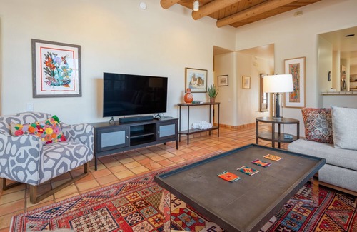 Quail Run House | Sun-soaked stay with community amenities, fireplace, grill, & al fresco dining