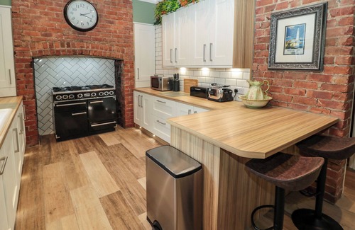 Whitley Bay Cottage | SUNFLOWERS, pet friendly, with open fire in Whitley Bay