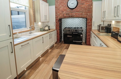Whitley Bay Cottage | SUNFLOWERS, pet friendly, with open fire in Whitley Bay