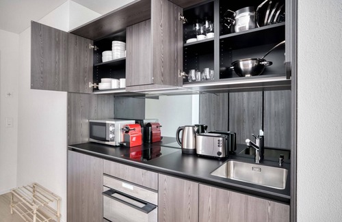 Sihlfeld Apartment | Sunlit Wiedikon 1 Room w/Storage & W/D, 1 min to Market, by Blueground