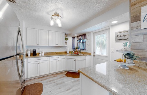 Cortez House | Sunny canal front home with a pool & dock - central location and dogs ok