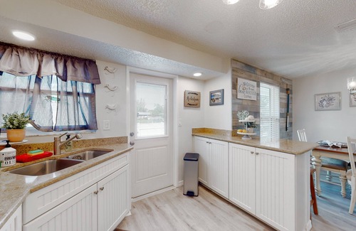 Cortez House | Sunny canal front home with a pool & dock - central location and dogs ok