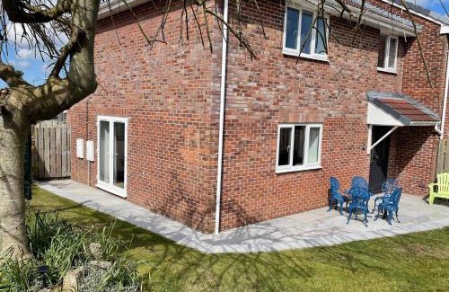Treator House | Sunny Corner, Padstow. Spacious 3 bedrooms, 2.5 bathrooms, parking, garden.