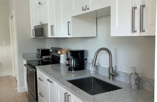Belfast Apartment | Sunny downtown Belfast apartment with water view, right on Main St near eateries