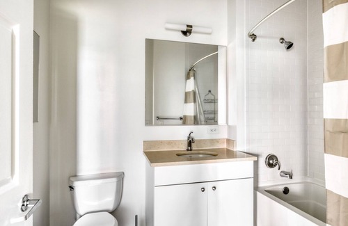 Hoboken Apartment | Sunny Hoboken 2BR w/ Gym, Shuttle, Lounge, Fire Pit & Pool, by Blueground