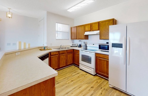 Sunset Ridge House | Sunny home near Disney with enclosed backyard, fast WiFi, W/D, patio, central AC