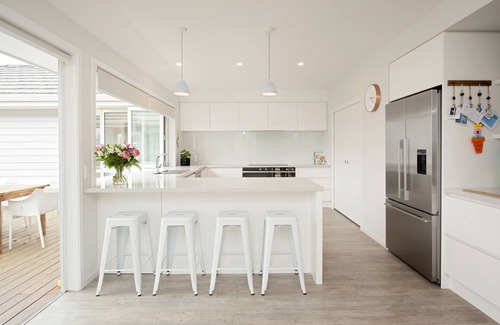 Richmond House | Sunny & spacious modern home with heated swimming pool.