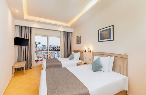 Village Road Hotel | SUNRISE Alma Bay Resort