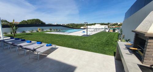 Olhos D'Agua Villa | Sunrise Villa by Laranjal Rentals