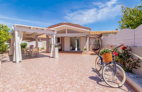 Valledoria Villa | SUNSET BAY POOL VILLA SARDINIA with private heated pool, jacuzzi, counter-current swimming