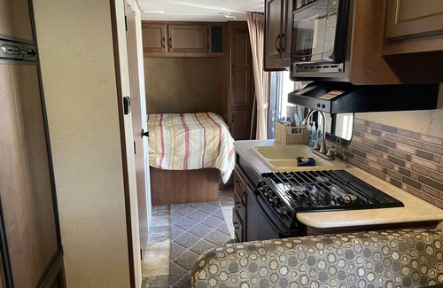 Dandridge RV Rental | Sunset Seeker is a cozy camper with a beautiful view of Lake Douglas!