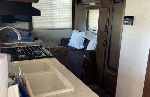 Dandridge RV Rental | Sunset Seeker is a cozy camper with a beautiful view of Lake Douglas!