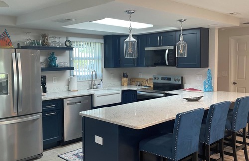 Gulf Harbors House | Sunset Serenity Retreat: Coastal Elegance with Poolside Bliss