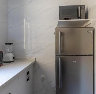 Kilimani Apartment | Sunset Skyline Alba by YourHost1 bedroom Nairobi