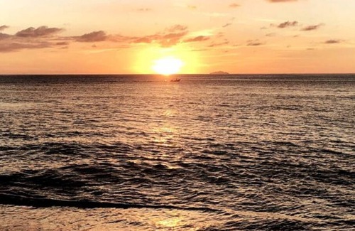 Aguadilla Pueblo Apartment | Sunset View Window w/ King Bed, Modern Beach Apartment