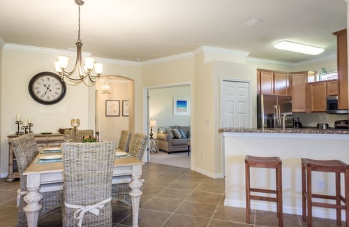 Gran Paradiso Villa | Sunset/water views. Luxurious resort community. Clean! Beautifully decorated!