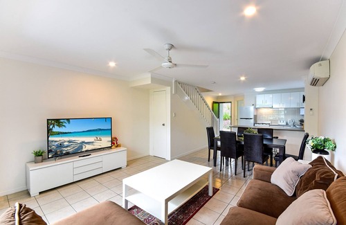 Hamilton Island Apartment | Sunset Waters 01 - Marina Side 2 Bedroom with buggy.