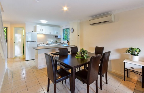 Hamilton Island Apartment | Sunset Waters 01 - Marina Side 2 Bedroom with buggy.