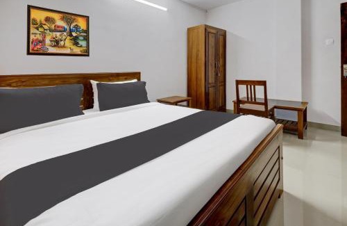 Thiruvananthapuram Hotel | Super Hotel O Anayara Near Lulu Mall formerly Timber Residency